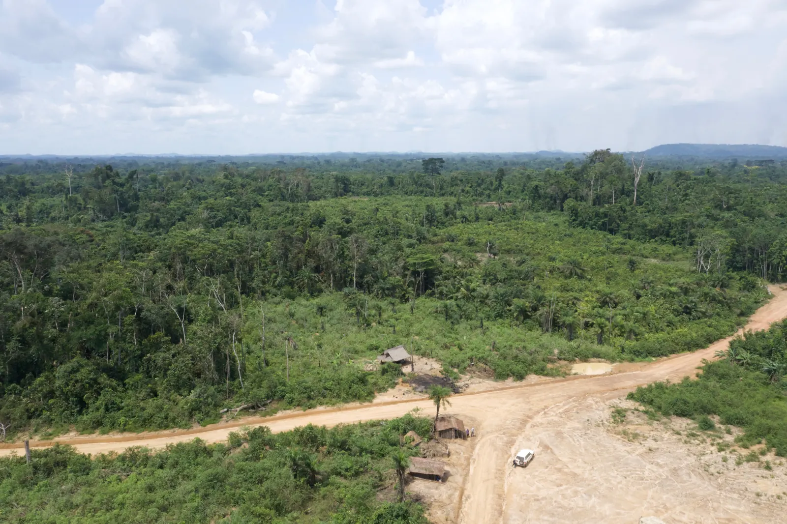 Aerial view of forest camp and access road in AW&L concession, Liberia